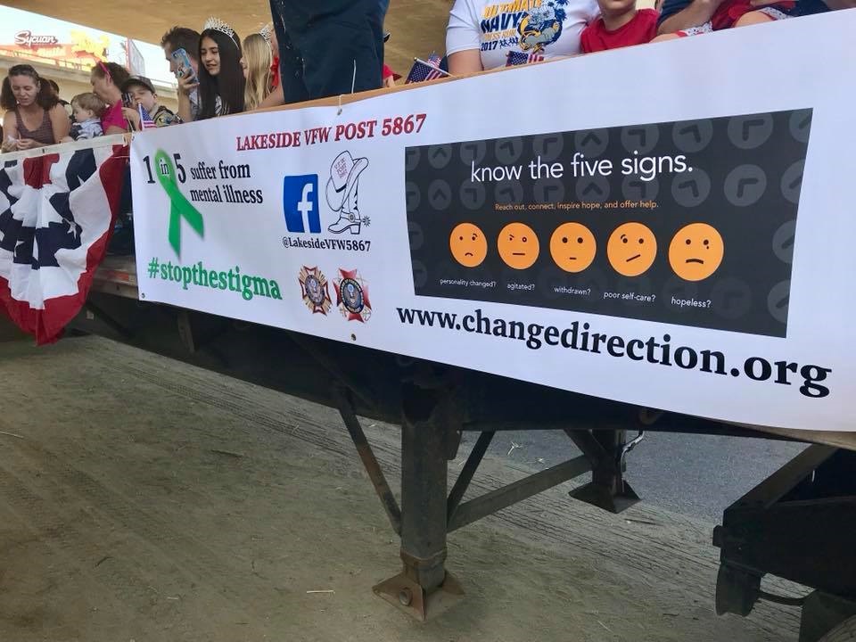 Carter-Smith VFW Post proudly displays their Change Direction/Stop the Stigma banner during the Lakeside Western Days Parade, April 2018. The goal of the Campaign to Change Direction is to change the culture of mental health in America so that all of those in need receive the care and support they deserve. The Campaign encourages all Americans to pay attention to their emotional well-being – and it reminds us that our emotional well-being is just as important as our physical well-being.